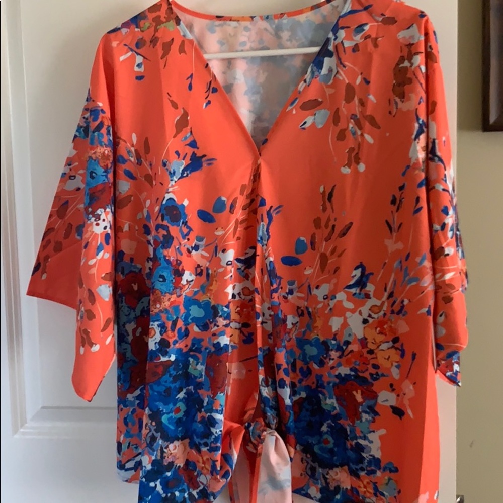 Gorgeous summer top. Never worn, Medium runs big.